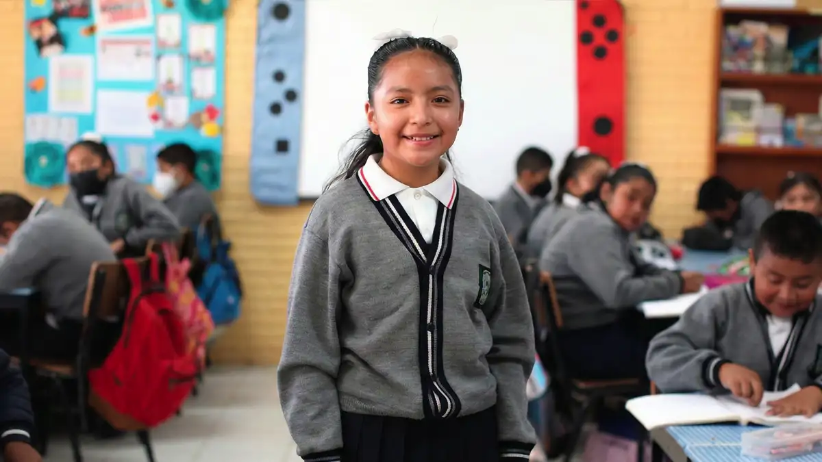 Estudiantes en clase de robótica representando la Responsabilidad Social Ford México y educación STEM.